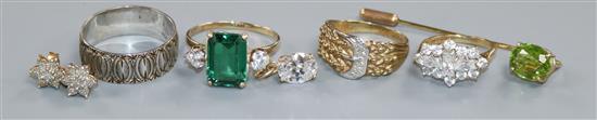 Four assorted 9ct gold rings including one set with diamonds, a pair of 9ct ear studs, 9ct pendant and stick pin.